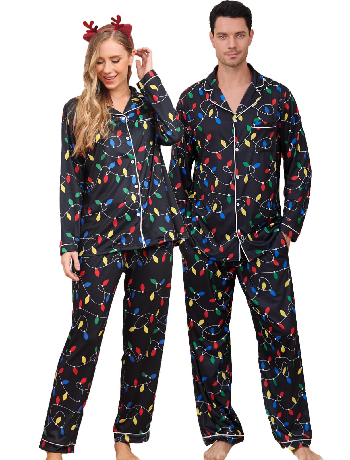 Couple wearing black Christmas light print pajamas with matching button up shirts and pants