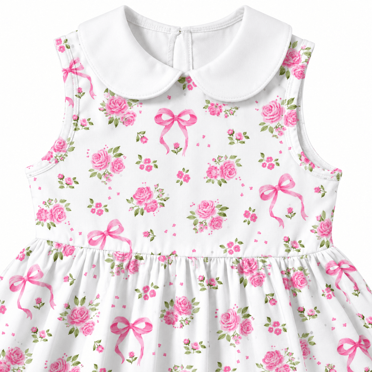 Flat lay of the girls pink floral dress showing the sleeveless design, floral print, and layered skirt shape.