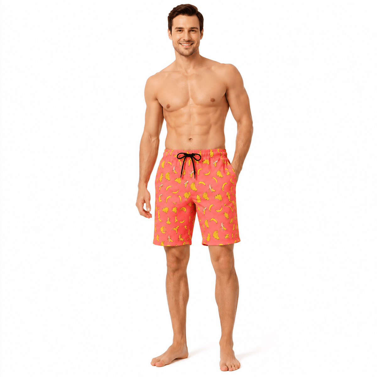 Man wearing orange banana print swim trunks with quick dry fabric and comfortable fit, stylish summer beach shorts.