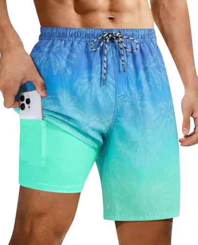 Man wearing blue palm tree gradient swim trunks with tropical vacation style