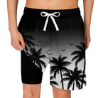 black palm tree print boys swim trunks with white drawstring for tropical beach vacations