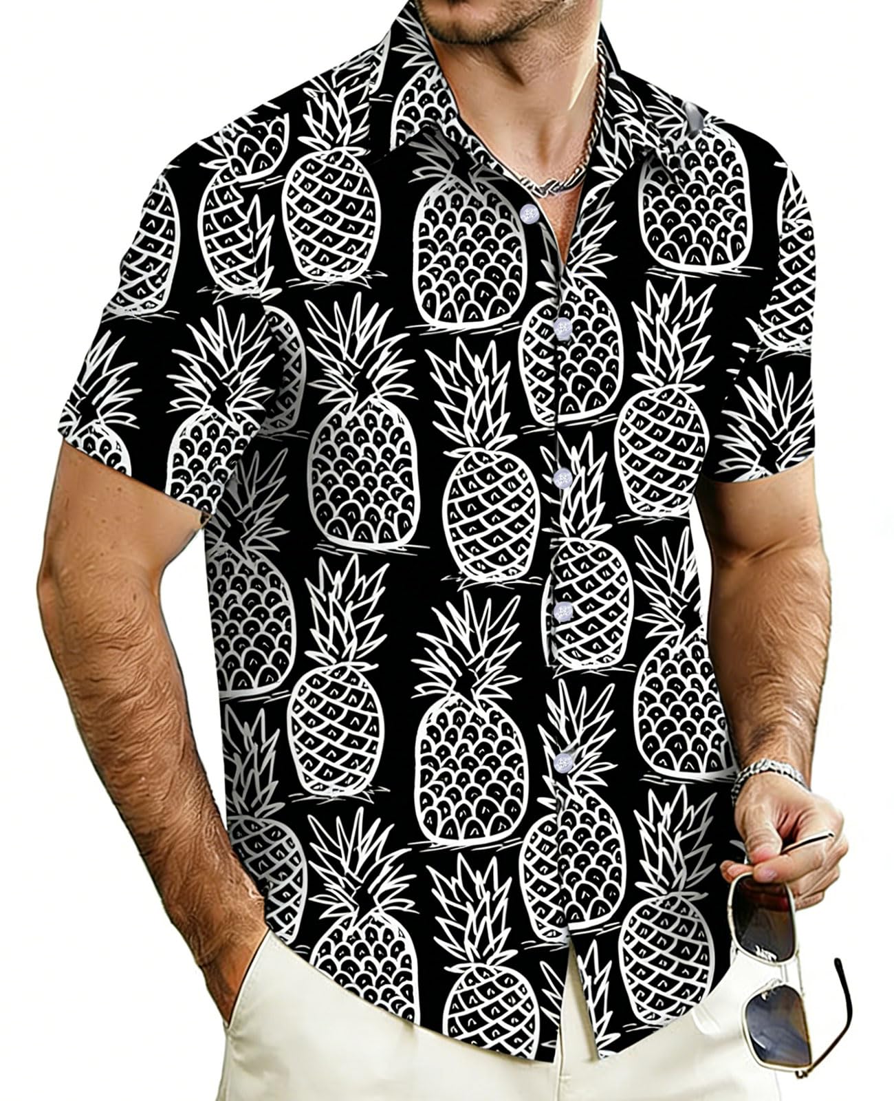 Men's black Hawaiian shirt featuring pineapple print for beach vacations.