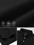 Close up of black polo shirt fabric showing stretch material, smooth texture and performance design for comfortable movement.