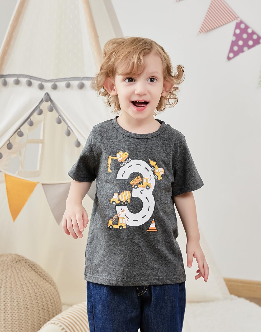 Boy wearing a number 3 birthday graphic T shirt, showing a cute party outfit style for birthday celebrations and photos.