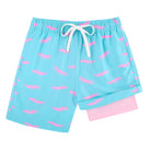 Boys blue crocodile printed swim trunks with compression liner and quick drying material for summer swimming.