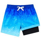 Boys blue gradient swim trunks with compression liner and lightweight quick dry fabric for swimming and outdoor activities.