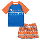 Boys Blue Ocean swim set with blue and orange short sleeve rash guard and matching ocean inspired printed swim trunks.