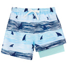 Boys blue shark compression swim trunks with quick dry fabric, perfect kids swim shorts for beach and pool activities.
