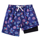 Boys deep blue swim trunks with comfortable liner and drawstring waist, suitable for swimming and beach activities.