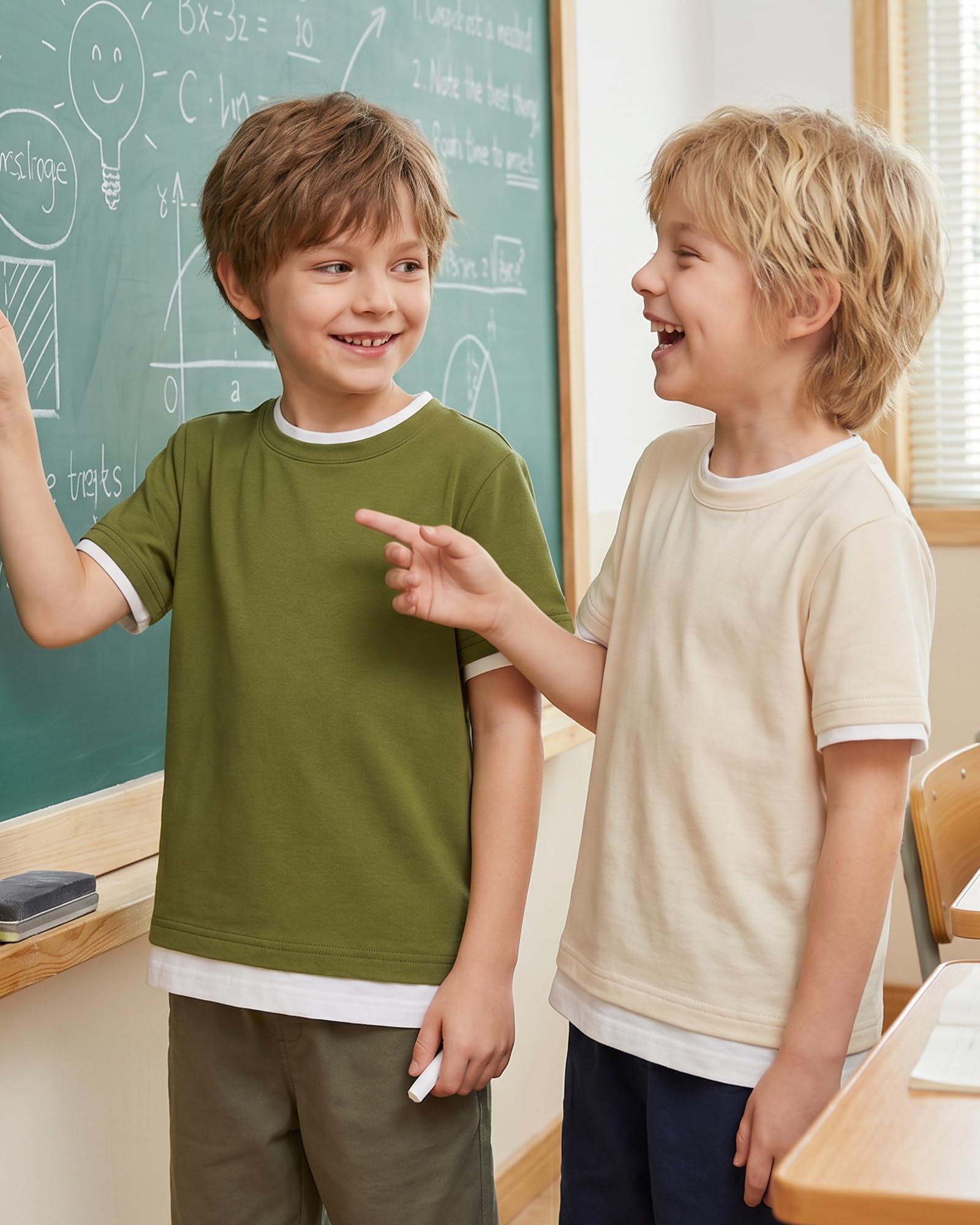 Boys wearing matching color block T shirt outfits, stylish casual kids clothing for family outings and daily wear.