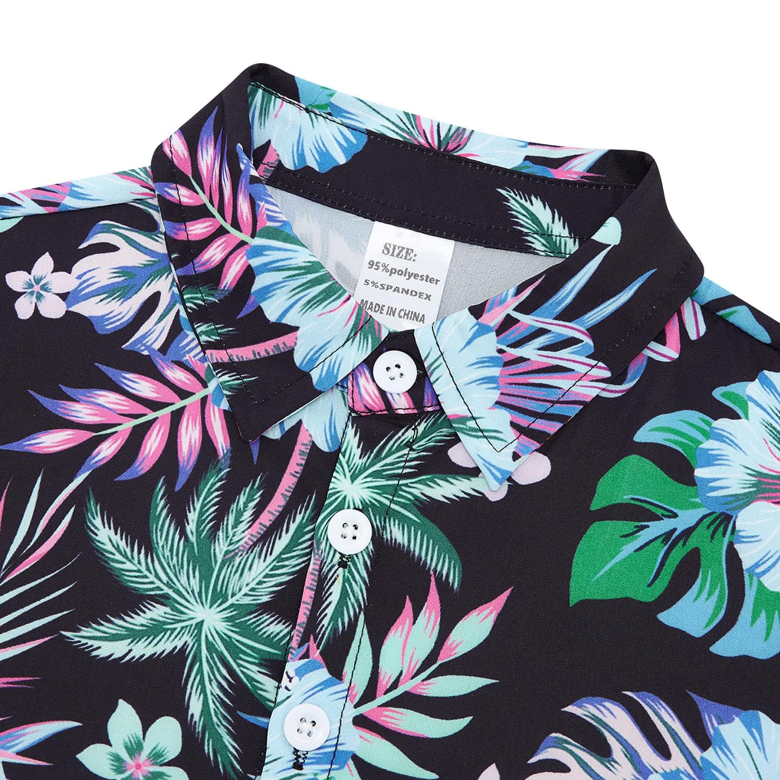 Close up view of boys Hawaiian shirt and swim shorts fabric showing tropical palm print pattern and colorful design.