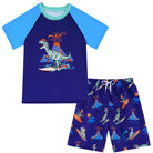 Boys navy dinosaur print swim set with short sleeve shirt and matching trunks, comfortable summer swimwear.