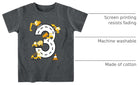 Close up of boys number 3 birthday graphic T shirt showing construction vehicle print, fade resistant screen printing, machine washable fabric and cotton material.