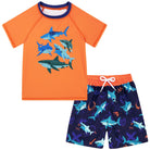 Boys orange shark printed swim set with short sleeve top and matching swim shorts, fun ocean inspired kids swimwear.