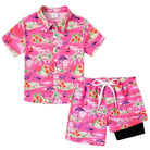 Boys Pink Tropical Hawaiian shirt and matching swim shorts with bright summer pattern, comfortable outfit for vacations.