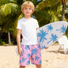Boys quick dry swim trunks designed for surfing and water activities with flexible fabric and comfortable fit.