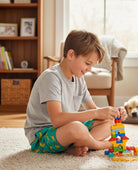 boy wearing quick dry tropical swim trunks for indoor and outdoor summer activities