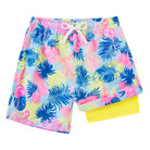Boys tropical floral swim trunks with lightweight fabric and liner support, perfect for beach and pool days.