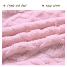 Close-up of girls coral fleece hoodie showing the soft plush texture, warm fabric surface and cozy winter material detail.