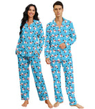 Blue matching pajama set for couples with soft stretch fabric, button-down top and comfortable full-length pants for home lounging.