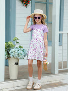 Girl wearing a floral sundress set during summer activities, showing a comfortable two piece outfit for warm weather.