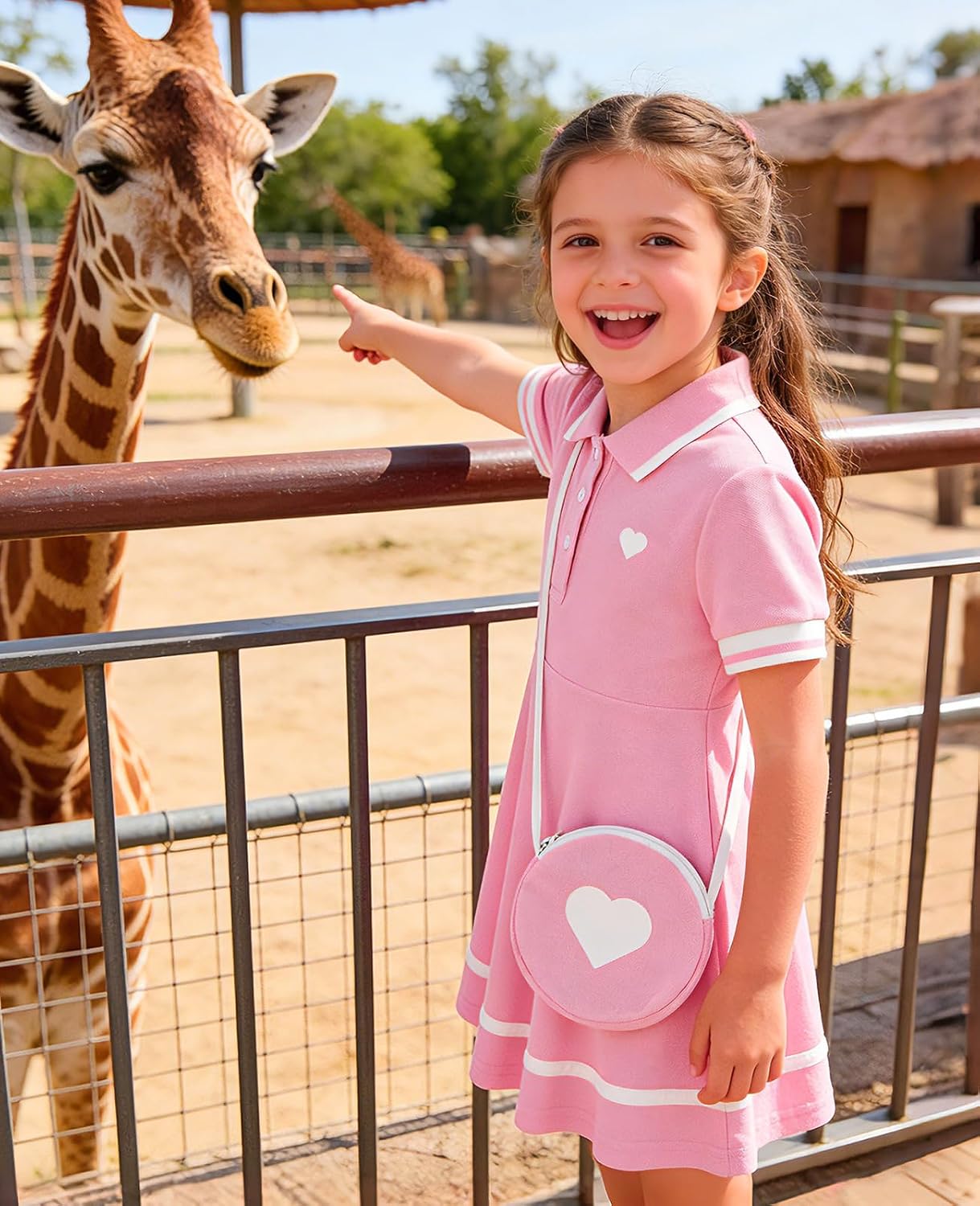 little girl wearing pink polo dress with crossbody bag summer vacation outfit
