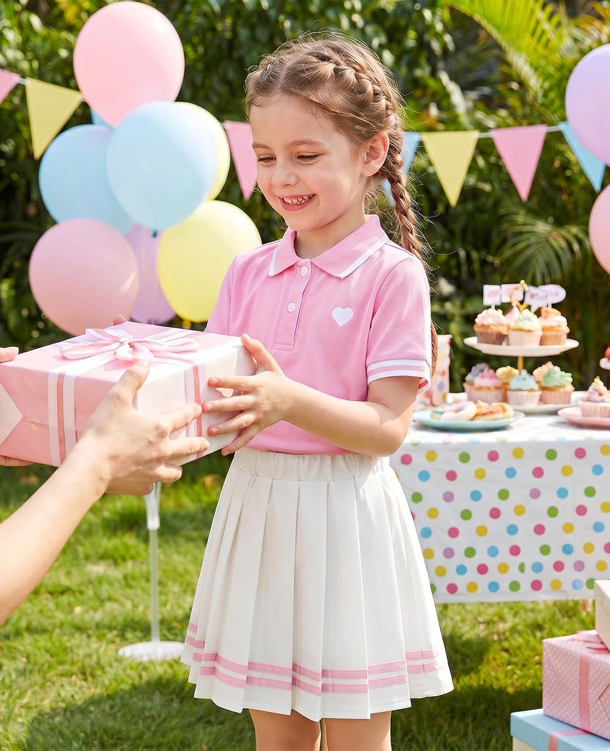 little girl wearing pink tennis polo dress set outdoors toddler summer vacation outfit