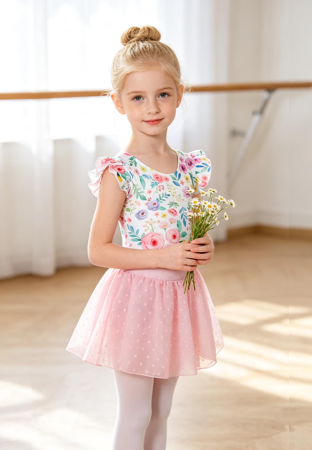 Girl wearing a floral ballet dress outfit during dance activities, flexible kids dancewear for movement and practice.