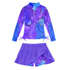 Girls blue marble pattern long sleeve swimsuit with skirted swim bottoms, unique printed swimwear for summer beach adventures.