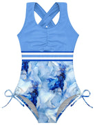 Girls blue marble one piece swimsuit with printed pattern, cross back straps and quick dry stretch fabric for swimming.
