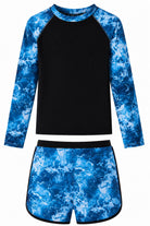 Girls blue waves long sleeve rash guard swimsuit set with ocean-inspired print, stretch fabric and matching bottoms for beach and pool activities.