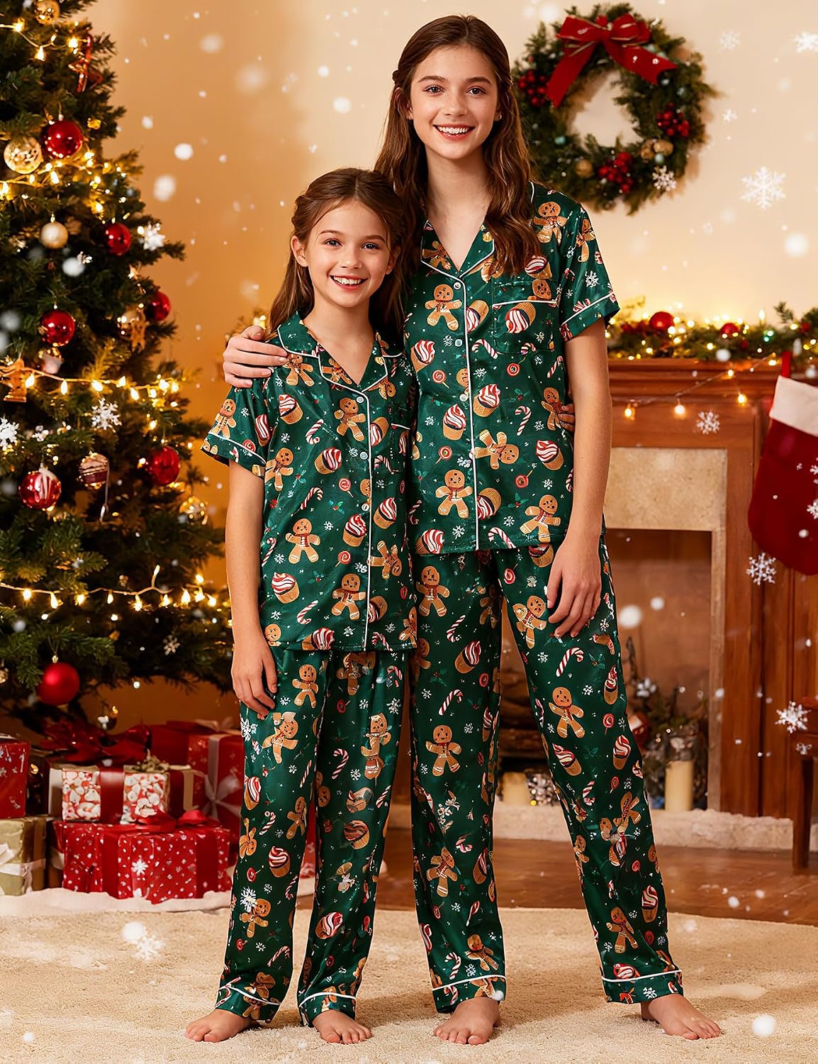 Girls wearing matching green Christmas pajama sets during a holiday celebration, showing festive family sleepwear style with Christmas tree and decorations.