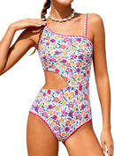 Girls Colorful Floral Print one piece swimsuit with vibrant flower pattern, asymmetrical strap and side cutout for summer swimming and vacations.