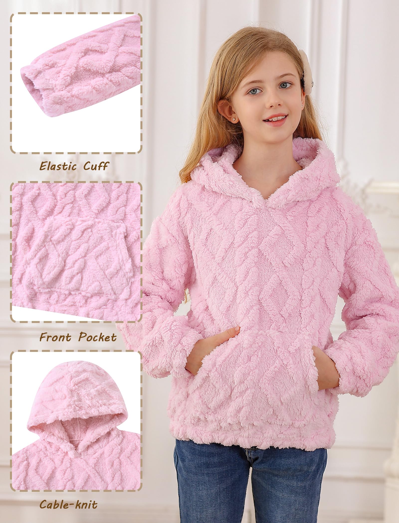 Close-up detail of girls coral fleece hoodie showing the soft plush fabric, hood design and textured surface for a warm winter layer.