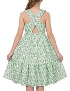 Girls green daisy rainbow strap sundress with colorful cross straps, lightweight summer dress for vacations and outdoor activities.