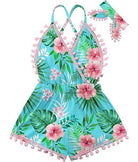 Girls green floral romper dress with matching headband, soft cotton blend clothing for summer vacations and family outings.