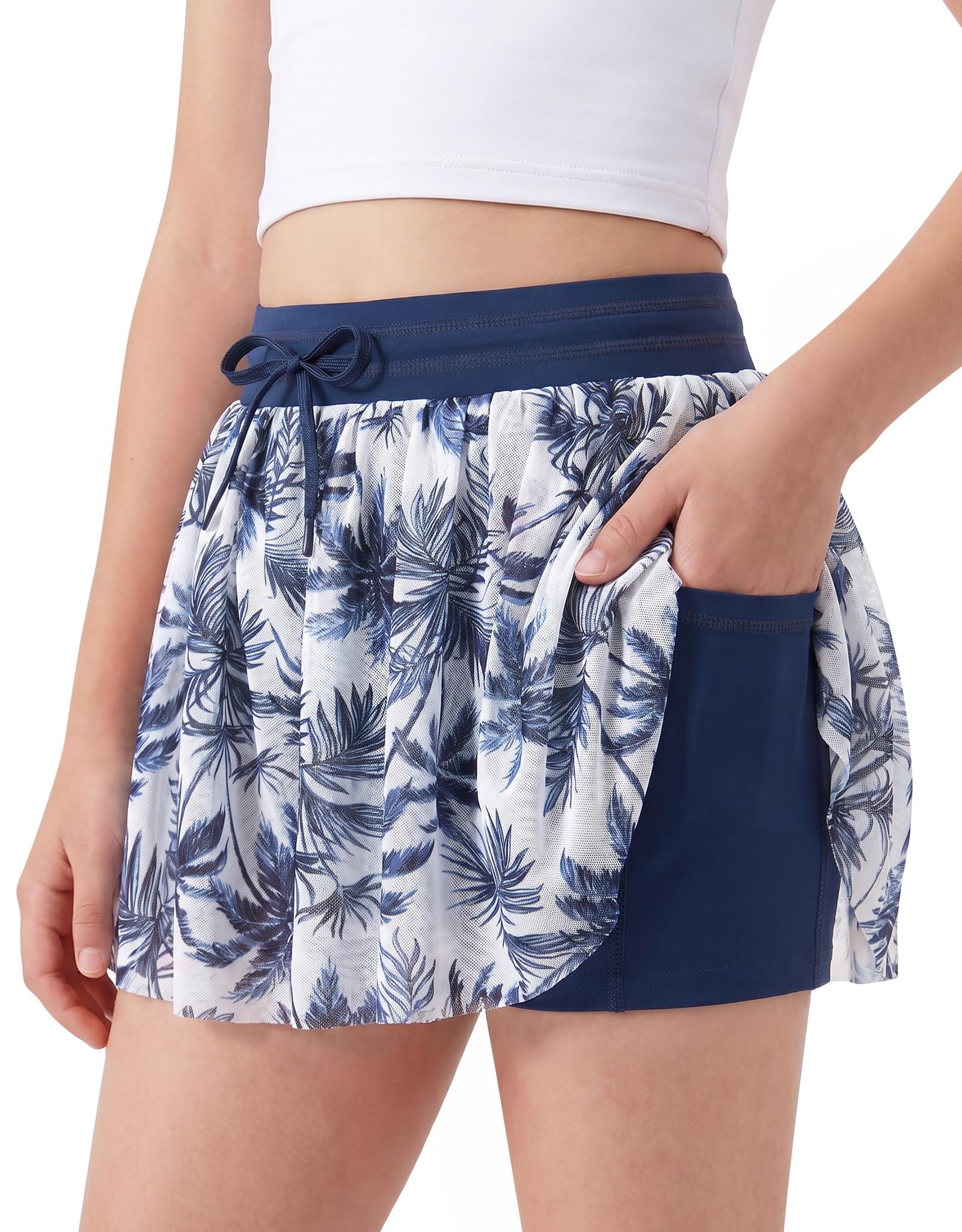 Girls Hawaiian print athletic shorts with high waist design and stretch fabric, colorful summer sports bottoms for kids.
