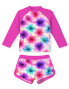 Girls hot pink floral printed swim set with long sleeve rash guard top and shorts, bright summer swimwear for beach activities.