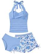 Girls wearing light blue tankini swimsuit set with matching swim shorts