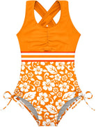 Girls orange floral one piece swimsuit with printed pattern, cross back straps and quick dry fabric for beach wear.