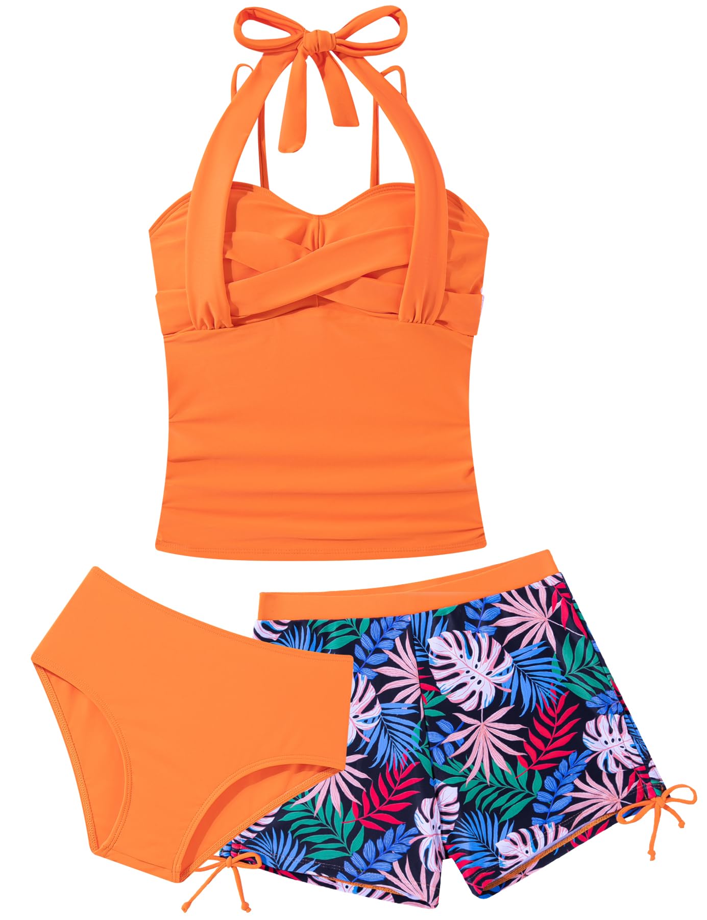 Girls orange tankini swimsuit featuring tropical leaf print design