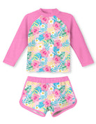 Girls pink floral long sleeve swimwear set with printed rash guard top and shorts, comfortable kids swimsuit for vacations.
