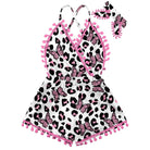 Girls pink leopard print romper dress with cute design and comfortable fabric, stylish toddler outfit for summer occasions.
