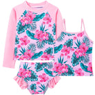 Girls pink printed rash guard swim set with long sleeve top, tankini and ruffle shorts for summer swimming.