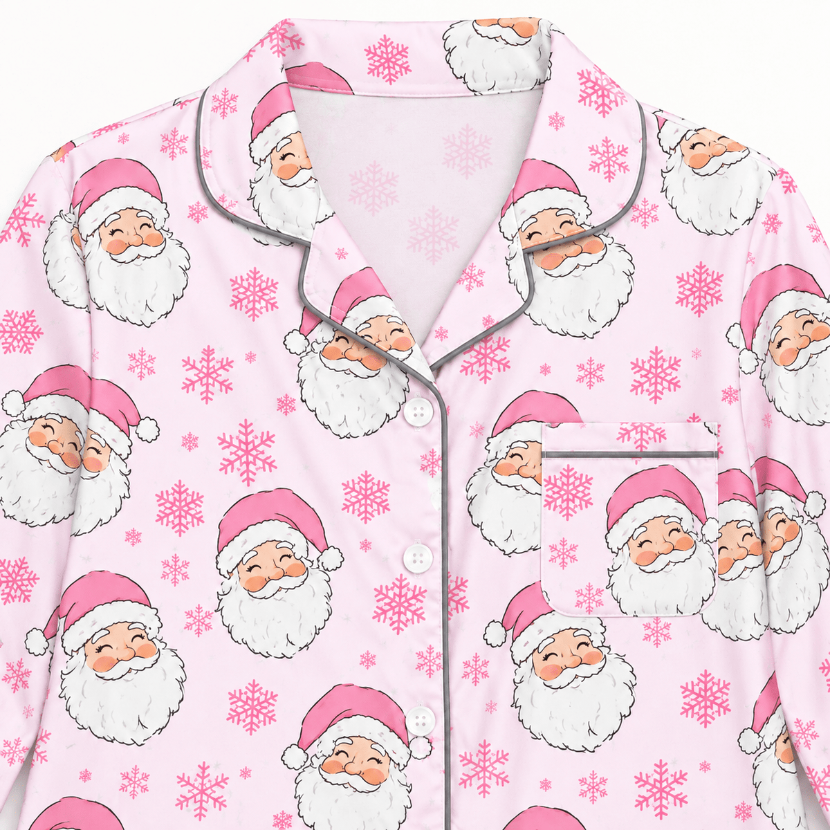 Pink Santa Claus Christmas pajama set featuring a button front top and matching long pants with festive snowflake and Santa print design.