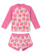 Girls pink strawberry print rash guard swim set with long sleeve top and shorts, adorable kids swimwear for beach and pool days.