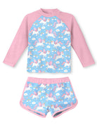 Girls pink unicorn printed long sleeve swimsuit set with matching shorts, cute kids swimwear for summer adventures.
