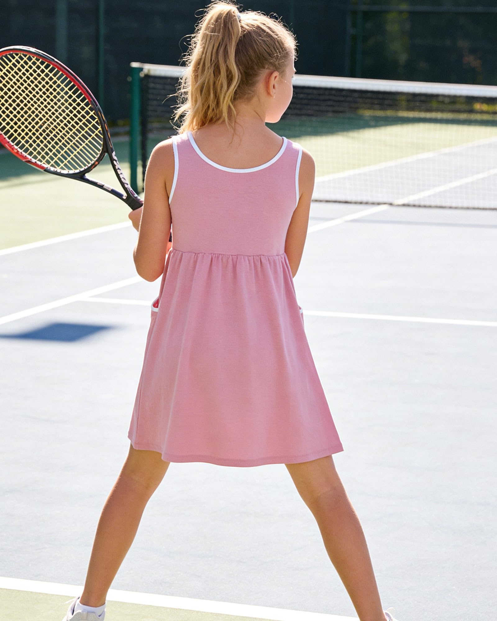 Back view of girls sleeveless dress set showing the relaxed fit, matching shorts and comfortable summer design.