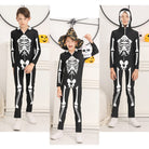 Kids wearing matching black skeleton jumpsuits together, showing the full-body bone print and Halloween costume styling.