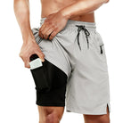 Men's light grey athletic workout shorts with phone pocket.